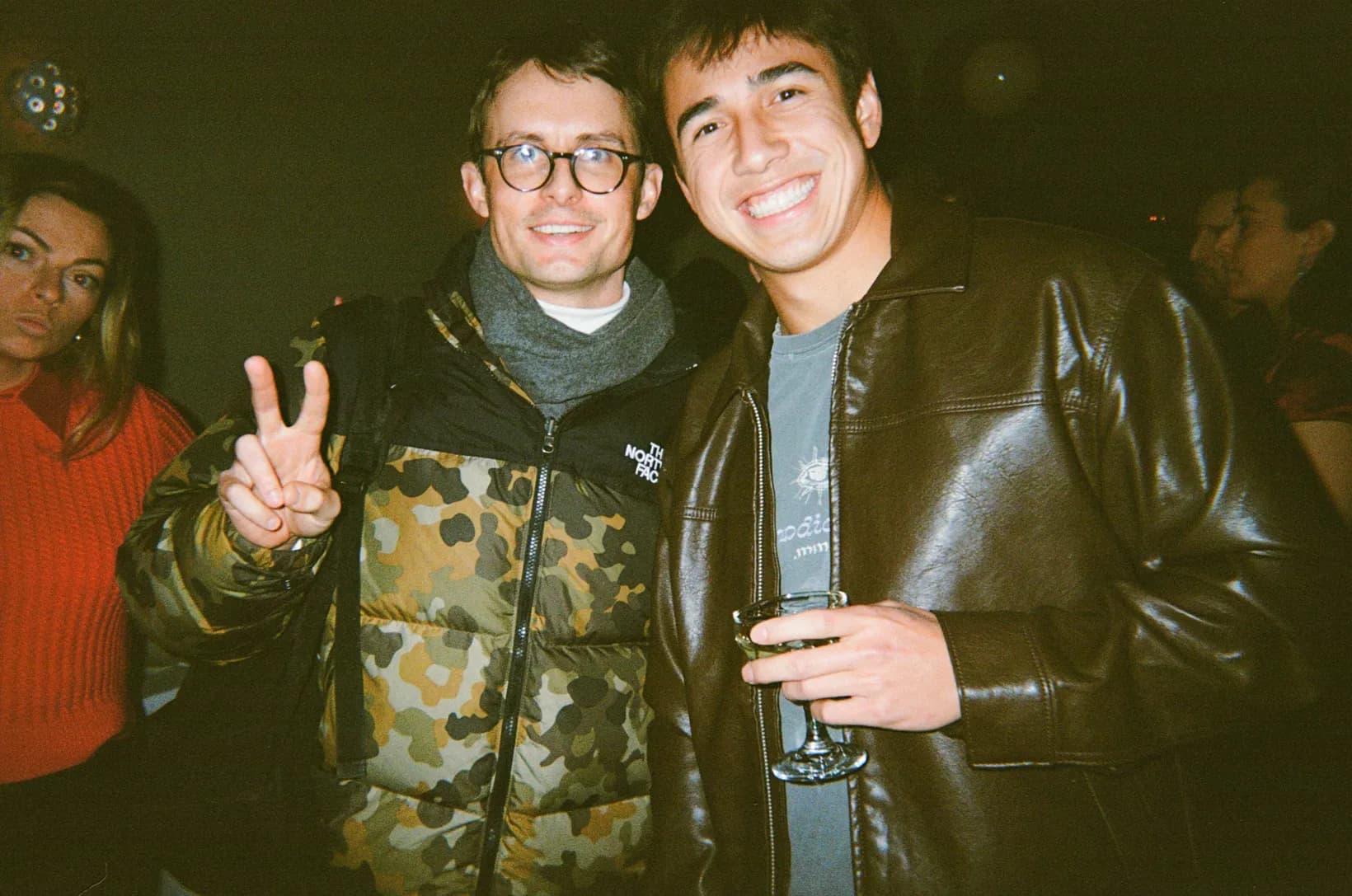 Two Rogo teammates grinning at the camera on a night out